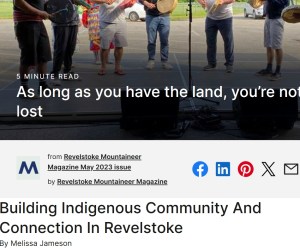 People standing outdoors holding hand drums and a microphone stand at their feet; visible headline text overlaid: "As long as you have the land, you're not lost." Below: article title "Building Indigenous Community And Connection In Revelstoke" and byline "By Melissa Jameson."